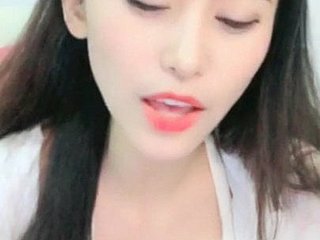 Whittle Cina MILF handjob di rumah cantik seksi 36D36D